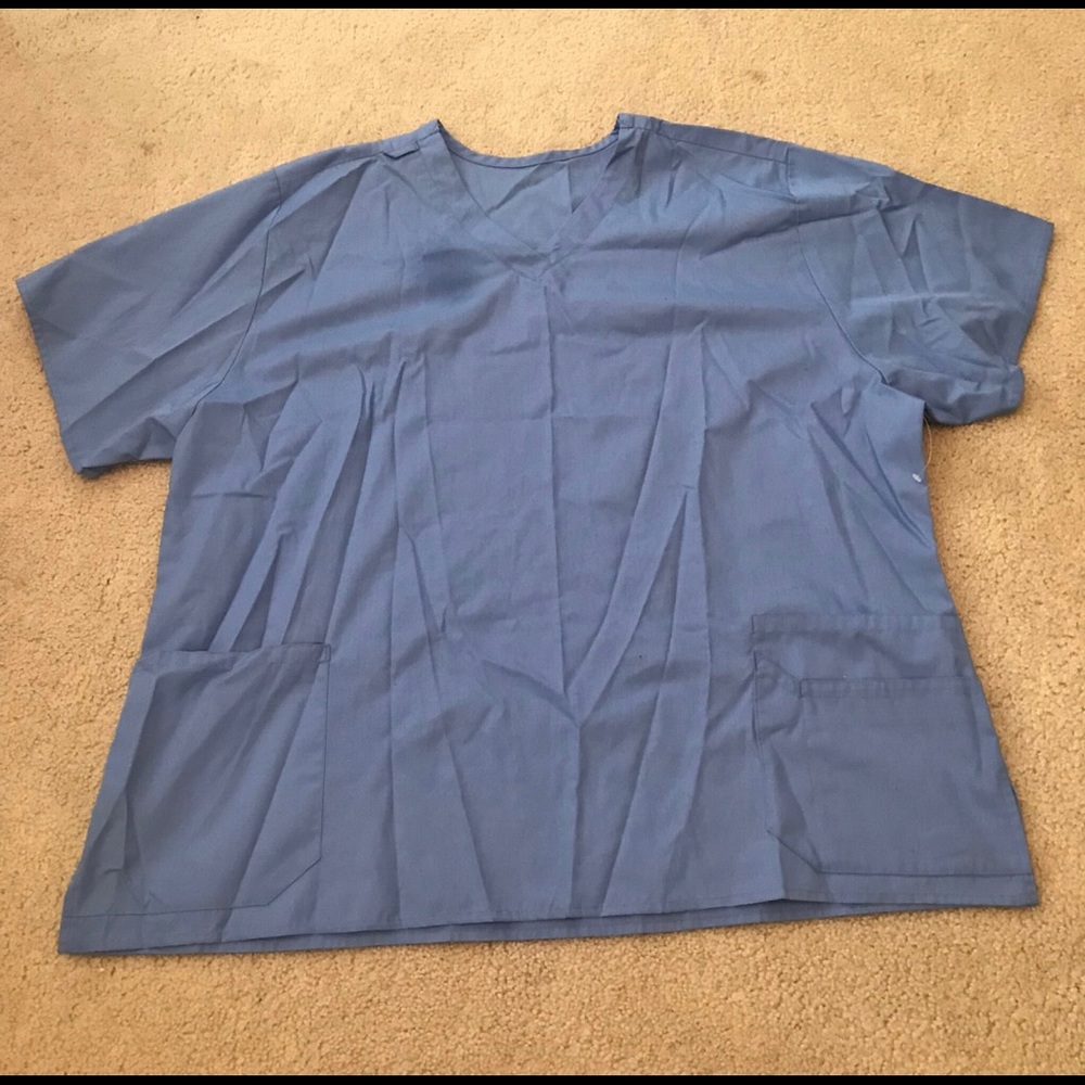 NEW XL LIGHT BLUE SCRUB TOP (STAINS SHOWN IN PICS)